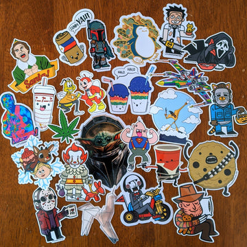 various stickers in a large group on a table