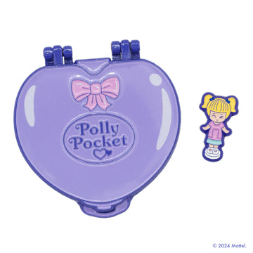 Purple Heart Compact Hinge Pin. This tiny Polly magnet can stick anywhere – inside the compact in her playhouse or outside on the landscape, and even on your refrigerator!