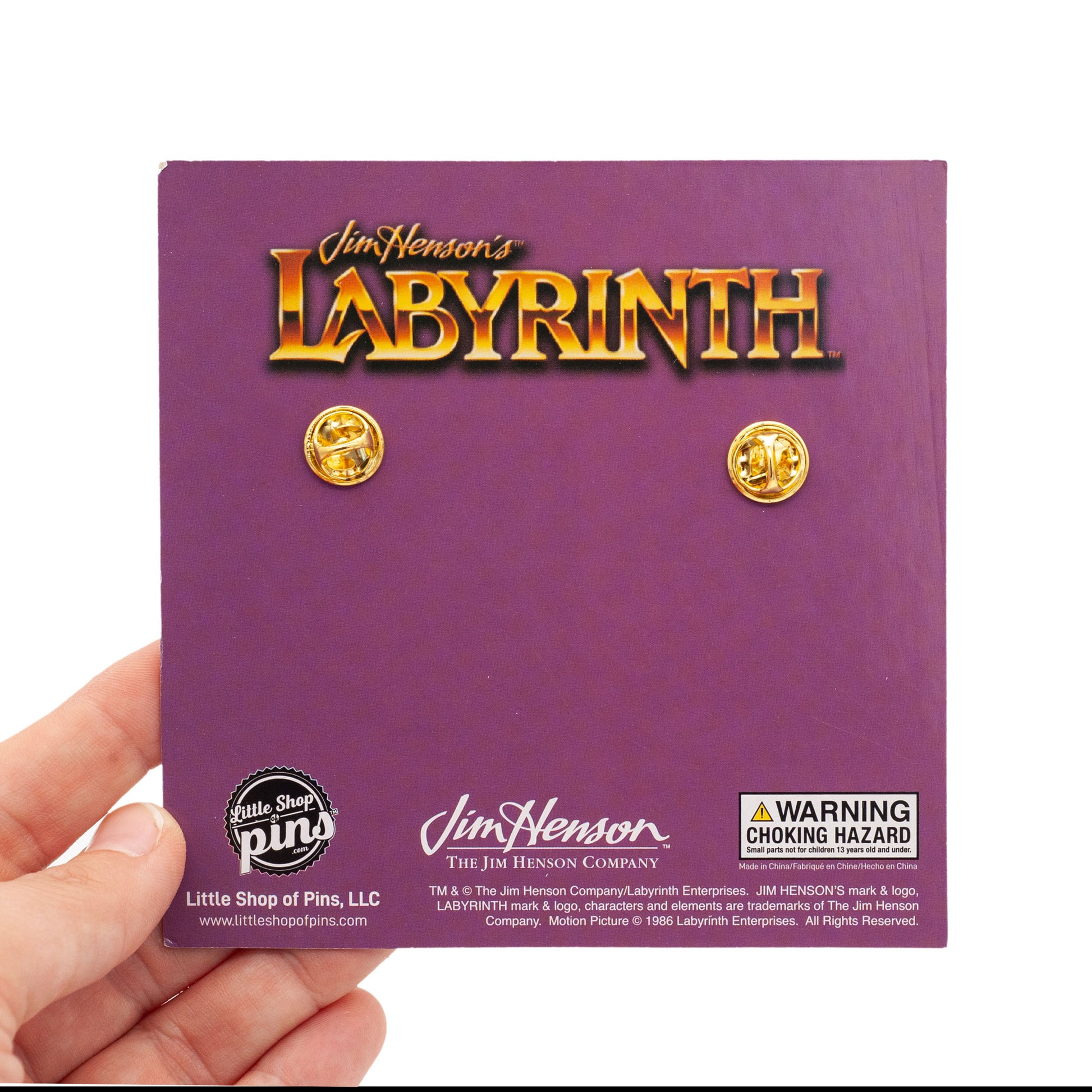 back of the labyrinth backing card with legal.